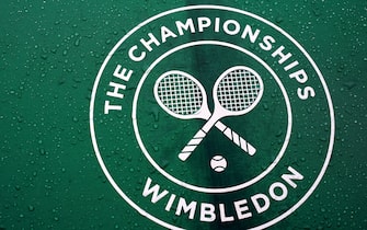 A general view of a Wimbledon logo as rain stops play on day two of the 2023 Wimbledon Championships at the All England Lawn Tennis and Croquet Club in Wimbledon. Picture date: Tuesday July 4, 2023.