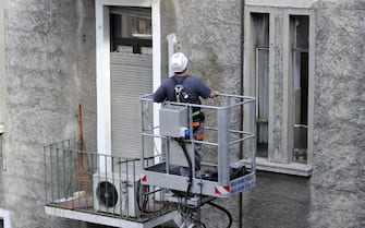 Milan (Italy), maintenance facade of a building