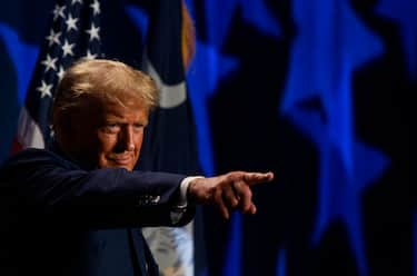 COLUMBIA, SOUTH CAROLINA - AUGUST 5: Former President Donald Trump pauses for cheers from the crowd before speaking as the keynote speaker at the 56th Annual Silver Elephant Dinner hosted by the South Carolina Republican Party on August 5, 2023 in Columbia, South Carolina. President Trump was introduced by South Carolina's Governor Henry McMaster. (Photo by Melissa Sue Gerrits/Getty Images)