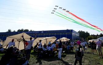 Italian Air Force (Aeronautica Militare)'s aerobatic demonstration team, the Frecce Tricolori (lit.Tricolour Arrows), show a colourful vapour trail as they fly over during the Opening Ceremony of the 2023 Ryder Cup golf tournament  at Marco Simone Golf Club in Guidonia, near Rome, Italy, 28 September 2023. The 44th Ryder Cup matches between the US and Europe will be held in Italy from 29 September to 01 October 2023.   ANSA/ETTORE FERRARI