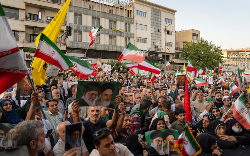 TEHRAN, IRAN - JUNE 22: Iranian protesters chant slogans in Revolution Square to protest US attacks on nuclear sites in Iran on June 22, 2025 in Tehran, Iran. In the early hours of June 22, the United States dropped a series of bombs on several alleged nuclear facilities in Iran, joining Israel's ongoing war with the country. Iran responded with a barrage of missiles at Israel and promised retaliation against US interests in the region. (Photo by Getty Images)
