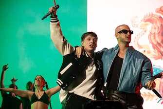 INDIO, CALIFORNIA - APRIL 19: (FOR EDITORIAL USE ONLY) (L-R) Peso Pluma performs with DJ Snake at the Coachella Stage during the 2024 Coachella Valley Music and Arts Festival at Empire Polo Club on April 19, 2024 in Indio, California. (Photo by Frazer Harrison/Getty Images for Coachella)
