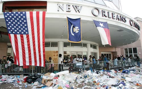 NEW ORLEANS, CA - SEPTEMBER 02:  Victims of the hurricane wait at the new Orleans Center to board buses to be taken to a shelter during the aftermath of Hurricane Katrina Saturday, September 3, 2005 in New Orleans, Louisiana. (Photo by Keith Birmingham/MediaNews Group/Pasadena Star-News via Getty Images)