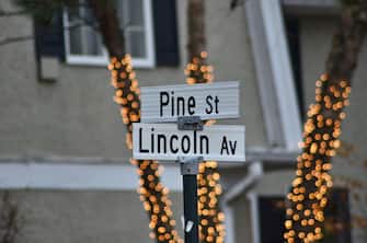 ILLINOIS, USA - DECEMBER 1: A view of street signs where  "Home Alone" house is located in Winnetka, Illinois  on December 1, 2021. Airbnb is offering a one-night-only rental of the iconic "Home Alone" house in Winnetka, Illinois. Guests will be welcomed by actor Devin Ratray, who played Kevin McCallister's older brother Buzz. The home will be available to book starting on Dec. 7. (Photo by Jacek Boczarski/Anadolu Agency via Getty Images)