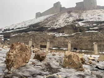 GAZIANTEP, TURKIYE - FEBRUARY 06: A view of damaged historical Gaziantep Castle after a 7.4 magnitude earthquake hit southern provinces of Turkiye, in Gaziantep, Turkiye on February 6, 2023. The 7.4 magnitude earthquake jolted Turkiye's southern province of Kahramanmaras early Monday, according to Turkiye's Disaster and Emergency Management Authority (AFAD). It was followed by a magnitude 6.4 quake that struck southeastern Gaziantep province. A third earthquake with a 6.5 magnitude also hit Gaziantep. Earthquakes had affected several provinces including, Osmaniye, Malatya, AdÃ Â±yaman, Adana, DiyarbakÃ Â±r, Kilis and Sanliurfa. (Photo by Mehmet Akif Parlak/Anadolu Agency via Getty Images)