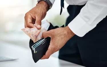 Businessman, hands and money wallet of euros for finance, trading economy and banking budget. Closeup of rich trader, financial profit and income for bonus bills, cash savings and accounting payment.