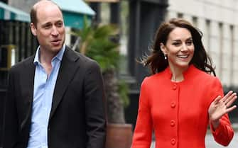 epa10608279 William, Prince of Wales, (L) and Catherine, Princess of Wales, walk through Soho to visit the Dog and Duck pub in London, Britain, 04 May 2023.  EPA/ANDY RAIN