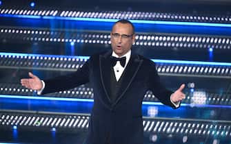 Sanremo Festival host and artistic director Carlo Conti on stage at the Ariston theatre during the 75th edition of the Sanremo Italian Song Festival, in Sanremo, Italy, 11 February 2025. The music festival will run from 11 to 15 February 2025.  ANSA/ETTORE FERRARI 
