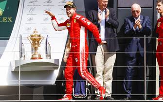 SILVERSTONE, UNITED KINGDOM - JULY 08: Sebastian Vettel, Ferrari, 1st position, walks like an egyptian during the British GP at Silverstone on July 08, 2018 in Silverstone, United Kingdom. (Photo by Glenn Dunbar / LAT Images)