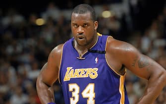 SACRAMENTO, CA - MARCH 20:  Shaquille O'Neal #34 of the Los Angeles Lakers looks on during the NBA game against the Sacramento Kings at Arco Arena on March 20, 2003 in Sacramento, California.  The Kings defeated the Lakers 107-99.  NOTE TO USER:  User expressly acknowledges and agrees that, by downloading and or using this Photograph, User is consenting to the terms and conditions of the Getty Images License Agreement.  Mandatory Copyright Notice:  Copyright 2003 NBAE  (Photo by Rocky Widner/NBAE via Getty Images)