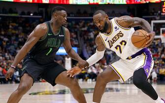 NEW ORLEANS, LOUISIANA - APRIL 14: Zion Williamson #1 of the New Orleans Pelicans defends against LeBron James #23 of the Los Angeles Lakers at Smoothie King Center on April 14, 2024 in New Orleans, Louisiana.  NOTE TO USER: User expressly acknowledges and agrees that, by downloading and or using this photograph, User is consenting to the terms and conditions of the Getty Images License Agreement. (Photo by Tyler  Kaufman/Getty Images)