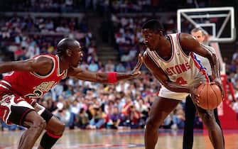 DETROIT - 1989: Michael Jordan #23 of the Chicago Bulls defends against Joe Dumars #4 of the Detroit Pistons  during an NBA game in Detroit, Michigan. NOTE TO USER: User expressly acknowledges  and agrees that, by downloading and or using this  photograph, User is consenting to the terms and conditions of the Getty Images License Agreement. (Photo by Andrew D. Bernstein/ NBAE/ Getty Images)