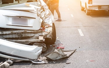 Auto accident involving two cars on a city street