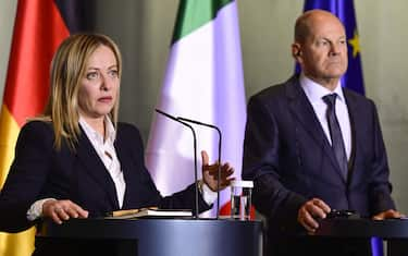 German Chancellor Olaf Scholz (R) and Italy's Prime Minister Giorgia Meloni address a joint press conference after talks at the Chancellery in Berlin on February 3, 2023. (Photo by John MACDOUGALL / AFP) (Photo by JOHN MACDOUGALL/AFP via Getty Images)