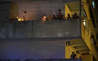 Fiaccolata a Scampia per le vittime del crollo alla vela celeste.