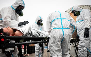 epa10717313 Ukrainian emergency response personnel take part in exercises to prepare for a possible attack on the nuclear power plant in Zaporizhzhia , Ukraine, 29 June 2023, amid the Russian invasion. Russian troops entered Ukrainian territory in February 2022, starting a conflict that has provoked destruction and a humanitarian crisis.  EPA/NICOLETTA STOYANOVA