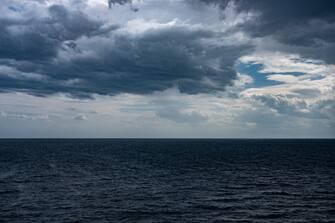 Dark clouds over the sea near Ancona, Italy, on September 25, 2020. (Photo by Wassilios Aswestopoulos/NurPhoto via Getty Images)