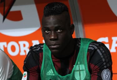 MILAN, ITALY - AUGUST 29:  Mario Balotelli of AC Milan looks on before the Serie A match between AC Milan and Empoli FC at Stadio Giuseppe Meazza on August 29, 2015 in Milan, Italy.  (Photo by Marco Luzzani/Getty Images)