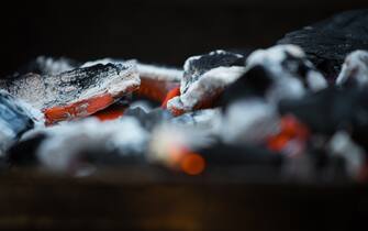 Close-Up Of Coal Burning In Barbecue
