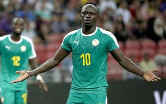 epa07910464 Sadio Mane of Senegal reacts during an international friendly match at the National Stadium in Singapore, 10 October 2019.  EPA/WALLACE WOON
