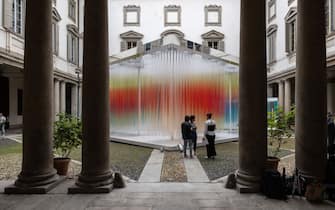 MILAN, ITALY - APRIL 15: Three people stand in front of the installation "Straordinaria" by Elica / we+ during the Milan Design Week 2024 at Palazzo Litta on April 15, 2024 in Milan, Italy. Every year, the Salone Internazionale del Mobile and Fuorisalone define the Milan Design Week, the world’s largest annual furniture and design event. Centered on principles of circular economy, reuse, and sustainable practices and materials, the Fuorisalone’s 24 theme: “Materia Natura”, seeks to foster a culture of mindful design. (Photo by Emanuele Cremaschi/Getty Images)