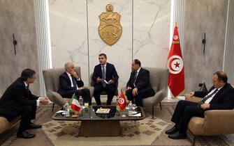 epa10629467 Italian Interior Minister Matteo Piantedosi (2-L)  with Tunisian Interior Minister Kamel Fekih (2-R) during their meeting at the airport in Tunis, Tunisia, 15 May 2023. Italian Interior Minister Matteo Piantedosi is on an official visit to Tunisia.This visit comes as Tunisia suffers from the increase in migratory flows.  EPA/MOHAMED MESSARA