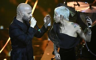 Italian vocalist Negramaro band, Giuliano Sangiorgi (L), and Italian singer Malika Ayane perform on stage at the Ariston theatre during the 74th Sanremo Italian Song Festival in Sanremo, Italy, 09 February 2024. The music festival runs from 06 to 10 February 2024.   ANSA/RICCARDO ANTIMIANI