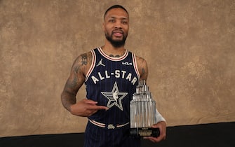 INDIANAPOLIS, IN - FEBRUARY 18: Damian Lillard #0 of the Eastern Conference poses for a photo with the Kobe Bryant All Star Game MVP Trophy after the 2024 73rd NBA All-Star Game on Friday, February 18, 2024 at Gainbridge Fieldhouse in Indianapolis, Indiana. NOTE TO USER: User expressly acknowledges and agrees that, by downloading and/or using this Photograph, user is consenting to the terms and conditions of the Getty Images License Agreement. Mandatory Copyright Notice: Copyright 2024 NBAE (Photo by Jesse D. Garrabrant/NBAE via Getty Images)