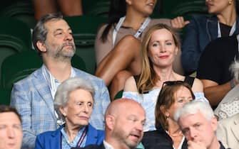 LONDON, ENGLAND - JULY 03: Judd Apatow and Leslie Mann watching Pedro Cachín V Novak Djokovic on day one of the Wimbledon Tennis Championships at the All England Lawn Tennis and Croquet Club on July 03, 2023 in London, England. (Photo by Karwai Tang/WireImage)