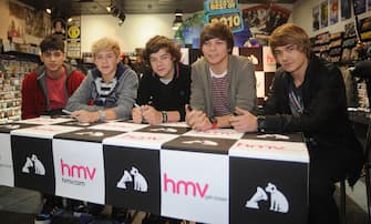 File photo dated 06/12/10 of One Direction (left to right) Zayn Malik, Niall Horan, Harry Styles, Louis Tomlinson and Liam Payne as One Direction fans rushed to the boyband's defence after footage was published appearing to show two of them smoking cannabis.
