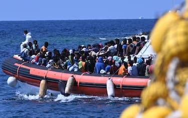Some migrants are taken in dinghies to be boarded on the Galaxy ferry which will head towards Porto Empedocle in  island of Lampedusa, southern Italy, 15 September 2023.A record number of migrants and refugees have arrived on the Italian island of Lampedusa in recent days. Lampedusa's city council declared a state of emergency on 13 September evening after a 48-hour continuous influx of migrants. In the morning of September 14, nearly 7,000 migrants were on the island. ANSA/CIRO FUSCO