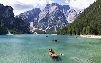 Tourism sailing boat in Lake braies, Dolomite, Italy.