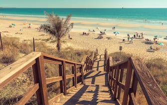 Broome, WA, Australia - People sunbathing at the Cable beach