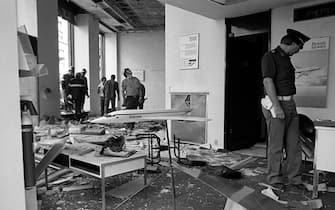 ROME, ITALY - SEPTEMBER 25: Terrorist attack on the offices of the British Airways airline in via Bissolati, with a suitcase bomb  exploded destroying the headquarters of the airline, immediately arrested the bomber is called Hasam Aatab is sixteen on Â Â September 25, 1985 in Rome,Italy. The attack was claimed by the Revolutionary Organization of Socialist Muslims (ORMS). The injured are three Italian employees of British Airways and another person believed to have been a customer. Another 10 people were reported injured, mostly by flying glass. (Photo by Stefano Montesi - Corbis/Getty Images)