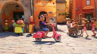 SIR VESPA -- In Disney and Pixar’s “Luca,” town bully Ercole Visconti (voice of Saverio Raimondo) is the repeat champion of the town’s Portorosso Cup race. He’s a Vespa-owning, pompadoured blowhard who has no doubt he can beat his newest challengers. Directed by Academy Award® nominee Enrico Casarosa and produced by Andrea Warren, “Luca” debuts on Disney+ on June 18, 2021. © 2021 Disney/Pixar. All Rights Reserved.