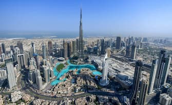 This picture taken on July 8, 2020 shows an aerial view of the Burj Khalifa skyscraper, the tallest structure and building in the world, in the Gulf emirate of Dubai, during a government-organised helicopter tour. (Photo by KARIM SAHIB / AFP) (Photo by KARIM SAHIB/AFP via Getty Images)