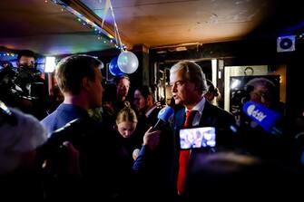 epa10990124 PVV leader Geert Wilders (C-R) talks to media after the results of the House of Representatives elections in Scheveningen, Netherlands, 22 November 2023. Dutch voters headed to the polls on 22 November to elect the members of the House of Representatives and a new prime minister, after Netherlands' longest-serving prime minister, Mark Rutte's cabinet collapsed in July.  EPA/REMKO DE WAAL