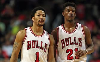 CHICAGO, IL - APRIL 27:  Derrick Rose #1 and Jimmy Butler #21 of the Chicago Bulls wait for a member of the Milwaukee Bucks to shoot a free throw during the first round of the 2015 NBA Playoffs at the United Center on April 27, 2015 in Chicago, Illinois. The Bucks defeated the Bulls 94-88. NOTE TO USER: User expressly acknowledges and agress that, by downloading and or using the photograph, User is consenting to the terms and conditions of the Getty Images License Agreement.  (Photo by Jonathan Daniel/Getty Images)