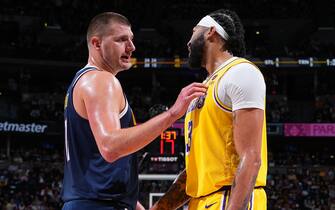 DENVER, CO - APRIL 29: Nikola Jokic #15 of the Denver Nuggets and Anthony Davis #3 of the Los Angeles Lakers talk during the game during Round 1 Game 5 of the 2024 NBA Playoffs on April 29, 2024 at the Ball Arena in Denver, Colorado. NOTE TO USER: User expressly acknowledges and agrees that, by downloading and/or using this Photograph, user is consenting to the terms and conditions of the Getty Images License Agreement. Mandatory Copyright Notice: Copyright 2024 NBAE (Photo by Garrett Ellwood/NBAE via Getty Images)