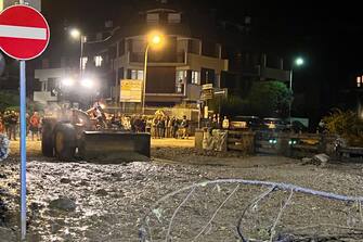 Foto LaPresse 13 agosto 2023 Bardonecchia, Italia - cronaca - Il torrente che attraversa il centro di Bardonecchia &#xe8; esondato nei pressi della piazza del municipio e di via Einaudi: una colata di fango e detriti in pieno centro