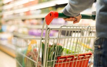 Close-up detail of a man shopping in a supermarket