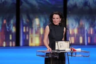 CANNES, FRANCE - MAY 25: Coralie Fargeat receives the 'Best Screenplay' award for 'The Substance' during the Closing Ceremony at the 77th annual Cannes Film Festival at Palais des Festivals on May 25, 2024 in Cannes, France. (Photo by Victor Boyko/Getty Images)