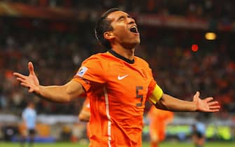 CAPE TOWN, SOUTH AFRICA - JULY 06:  Giovanni Van Bronckhorst of the Netherlands celebrates scoring the opening goal during the 2010 FIFA World Cup South Africa Semi Final match between Uruguay and the Netherlands at Green Point Stadium on July 6, 2010 in Cape Town, South Africa.  (Photo by Lars Baron/Getty Images)