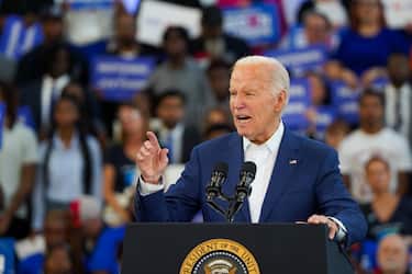 epa11475359 US President Joe Biden speaks during a campaign event at the Renaissance High School in Detroit, Michigan, USA, 12 July 2024. President Biden is under increasing pressure from the Democrats to step down as the party s presidential candidate.  EPA/DIEU-NIALO CHERY