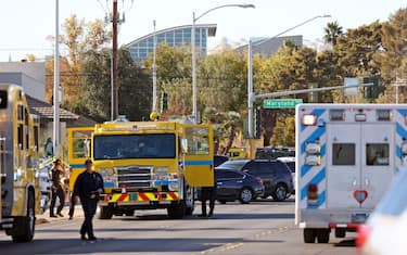 Emergency crews and law enforcement respond to a shooting at the University of Nevada, Las Vegas, campus in Las Vegas on December 6, 2023. "Multiple victims" were reported in a shooting at a US university on December 6, 2023, with police saying a short time later the suspect was dead. Students and members of the public had been told to avoid the area after reports of an active shooter on the campus of the University of Nevada Las Vegas. (Photo by Ronda Churchill / AFP) (Photo by RONDA CHURCHILL/AFP via Getty Images)