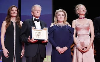 CANNES, FRANCE - MAY 16: (L to R) Mistress of ceremonies Chiara Mastroianni, Michael Douglas with the Honorary Palme Dâ  Or, Catherine Deneuve and Uma Thurman during the opening ceremony at the 76th annual Cannes film festival at Palais des Festivals on May 16, 2023 in Cannes, France. (Photo by Pascal Le Segretain/Getty Images)