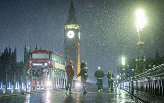 Mandatory Credit: Photo by Marcin Nowak/LNP/Shutterstock (15073506f)
People crossing Westminster Bridge in central London brave snowfall. According to the Met Office sleet will change back to rain overnight as warmer air comes in from the southwest. Winds will get stronger, especially near the coast. The lowest temperature will be 0°C.
Snowfall in London, Westminster Bridge, London, UK - 04 Jan 2025