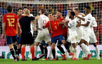 epa07095905 Spain's and England's players brawl against each other during the UEFA Nations League soccer match between Spain and England at Benito Villamarin stadium in Seville, southern Spain, 15 October 2018.  EPA/JULIO MUNOZ