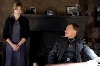 Lea Seydoux (Charlotte Lapadite) and Christoph Waltz (Colonel Landa) star in Quentin Tarantino's INGLOURIOUS BASTERDS. 