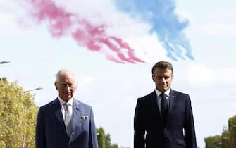 epa10871527 Britain's King Charles III (L) and French president Emmanuel Macron (R) attend a remembrance ceremony at Arc de Triomphe Paris, France, 20 September 2023. The visit, initially planned in March and postponed because of unrest in France, will lead the King and Queen of Great Britain to Paris and Bordeaux and includes a state dinner, official appointments with president Macron and more informal meetings with French and British citizens.  EPA/YOAN VALAT / POOL